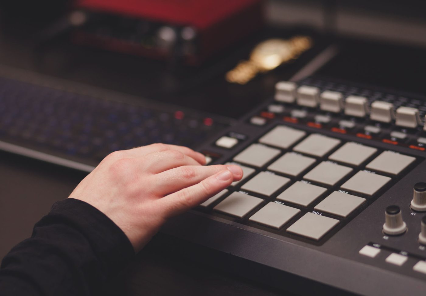 man in the studio creates electronic music